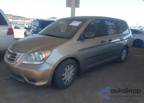 2010 Honda Odyssey Lx z USA, uszkodzony, nr VIN 5FNRL3H29AB004878